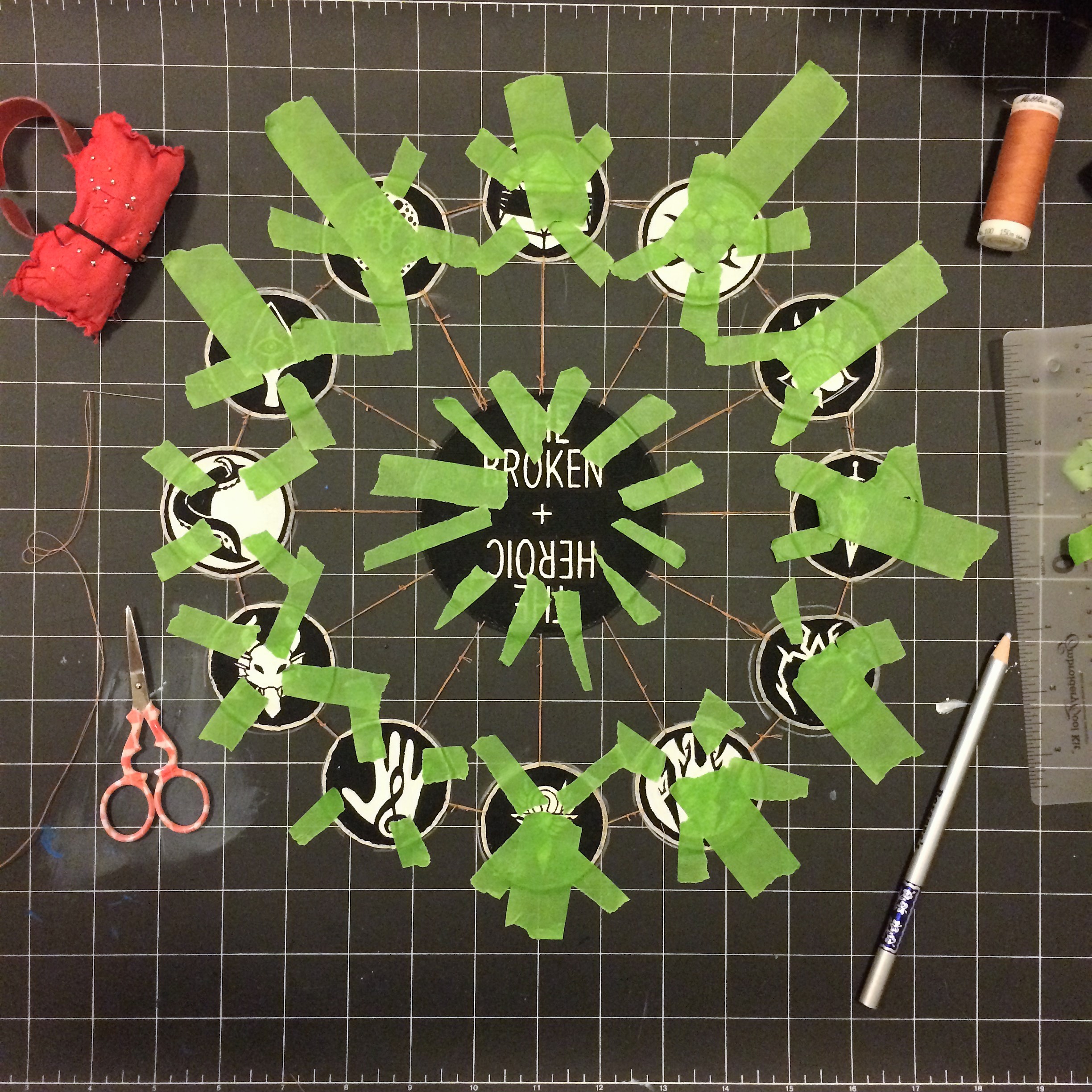 Patches tapped to a mat and sewn together in a web