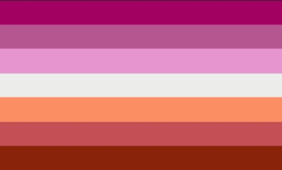 Lesbian flag with 7 horizontal stripes which are colored (top to bottom): dark pink, mid pink, light pink, white, orange, brick red, mid red